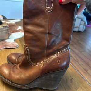 Frye wedge boots.  Good condition.  Some scuffs and markings. See photos